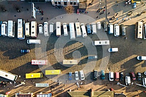 Aerial view of many cars and buses moving on a busy city street