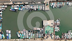 Aerial view of many fishing boats in fishing port