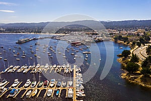 Aerial view of many yachts docked by the coastline in Monterey Bay Aquarium, in central California