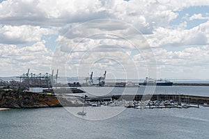 Aerial view marina Porto De Recreio De Sines under cloudy sky, Portugal