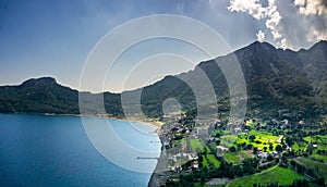 Aerial view from Marmaris, Kumlubuk beach, sea and mountain. Holiday and summer background. Amos Ancient city. Lycian way