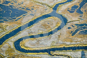 Aerial view of marsh, wetland abstraction of salt and seawater, and Rachel Carson Wildlife Sanctuary in Wells, Maine