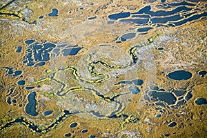 Aerial view of marsh, wetland abstraction of salt and seawater, and Rachel Carson Wildlife Sanctuary in Wells, Maine