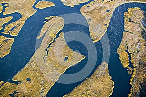 Aerial view of marsh, wetland abstraction of salt and seawater, and Rachel Carson Wildlife Sanctuary in Wells, Maine