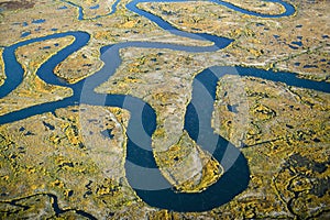 Aerial view of marsh, wetland abstraction of salt and seawater, and Rachel Carson Wildlife Sanctuary in Wells, Maine