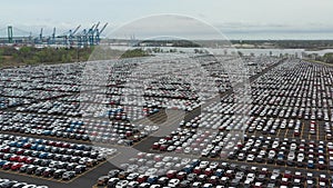 Aerial view of massive parking lot for new car imports