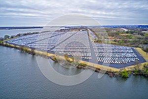 Aerial view of massive parking lot for new car imports