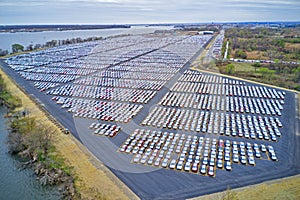 Aerial view of massive parking lot for new car imports photo
