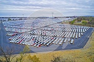 Aerial view of massive parking lot for new car imports