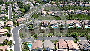 Aerial view of master-planned private communities with big villas with swimming pool, Mission Viejo.