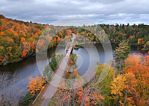 McClure storage basin with old 510 bridge surrounded by fall foliage