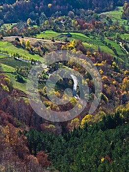 Aerial view of meadows and rolling hills in autumn, Bobija mountain