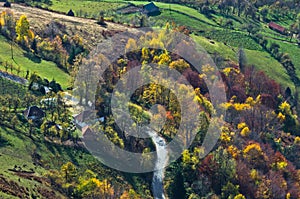 Aerial view of meadows and rolling hills in autumn, Bobija mountain