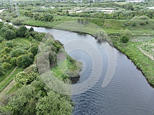 Aerial view of a meander in the River Mersey with Woolston Eyes in the background, England, UK