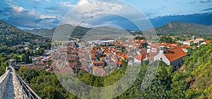 Aerial view from the medieval fortifications over the small town of Ston and the historic salt pans. Dubrovnik area, Croatia