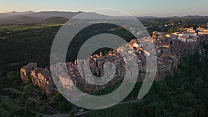 Aerial view of the medieval town of Pitigliano at sunset, Tuscany, Italy