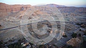 Aerial view Medinet Habu temple from hot air balloon with Valley of the kings skyline background Luxor Egypt