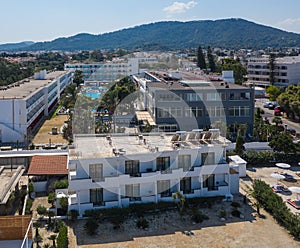 Aerial view on Mediterranean beach and small coastal hotel. Rhodes Greece