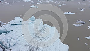 Aerial view of melting glaciers and icebergs in alarming rate in Antarctica