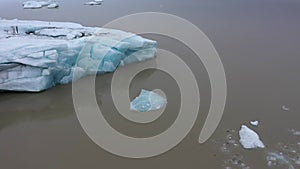 Aerial view of melting glaciers and icebergs in alarming rate in Antarctica. Climate change and global warming