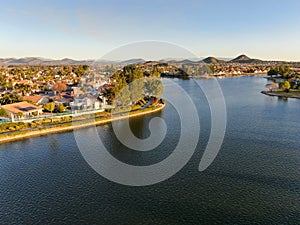 Aerial view of Menifee Lake and neighborhood, residential subdivision vila during sunset.