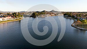 Aerial view of Menifee Lake and neighborhood, residential subdivision vila during sunset.