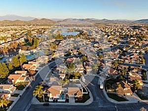 Aerial view of Menifee neighborhood, residential subdivision vila during sunset.