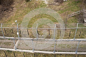 Aerial view of a metal fence in zoopark