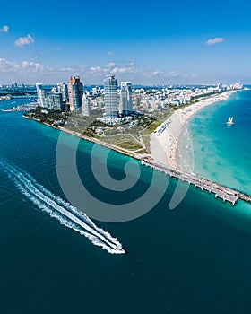 Aerial view of Miami Beach with speedboat in view