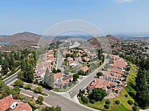 Aerial view of middle class neighborhood with residential house community, South California