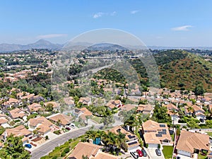 Aerial view of middle class neighborhood street with residential house