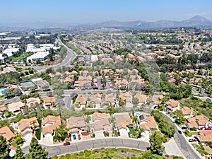 Aerial view of middle class neighborhood street with residential house