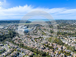 Aerial view of middle class subdivision neighborhood with residential houses in San Diego, California, USA.