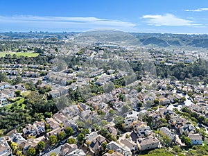 Aerial view of middle class subdivision neighborhood with residential houses in San Diego, California, USA.