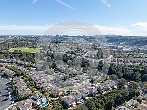 Aerial view of middle class subdivision neighborhood with residential houses in San Diego, California, USA.