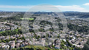 Aerial view of middle class subdivision neighborhood with residential houses in San Diego, California, USA.
