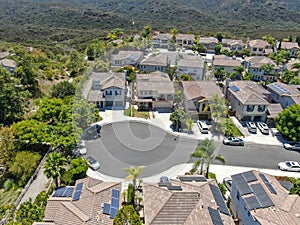 Aerial view of middle class subdivision neighborhood with residential villas next to each other.