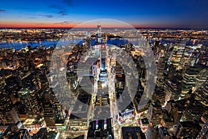 Aerial view of Midtown West Manhattan with new Hudson Yards skyscrapers under contruction at twilight. Manhattan, New York City