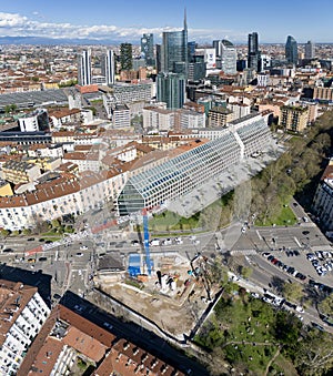 Aerial view of of Milan, skyscrapers. Excavations of the Resistance museum. Bosco Verticale. Unicredit tower, Unipol tower.