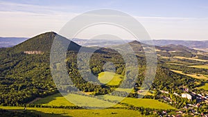 Aerial view of Milesovka mountain and Kletecna mountain photo