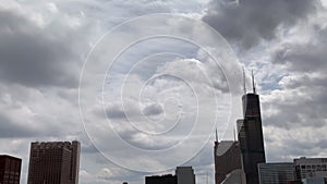 Aerial view of military jet as it soars over Chicago Loop skyline