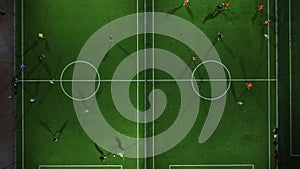 Aerial view of a mini football match, soccer. MiniFootball field and Footballers from drone