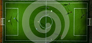 Aerial view of a mini football match, soccer. MiniFootball field and Footballers from drone