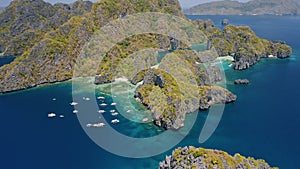 Aerial view of Miniloc Island. El-Nido, Palawan. Philippines. Limestone karst rock ridge formation surrounded by ocean