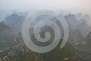 Aerial view of misty karst mountains in GuangXi