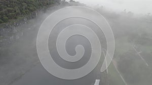 Aerial view of a misty lake landscape in Australia