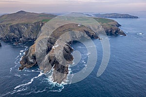 Aerial view with Mizen Head Lighthouse with spectaculars cliffs in West Cork Ireland