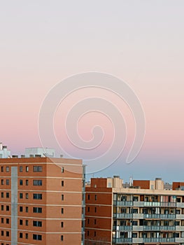 Aerial view on modern apartment buildings in condo neighbourhood against vivid sky in Zaragoza, Spain