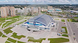 Aerial view on modern building. Modern building view from the sky. Domed roof in shades of metallic blue and gray colors