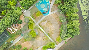 Aerial view on Modern colorful children playground in public park